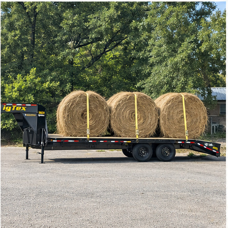 Hay bales loaded on a flat-deck trailer for East Texas transport